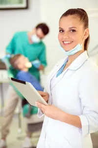 dental hygienist with clipboard